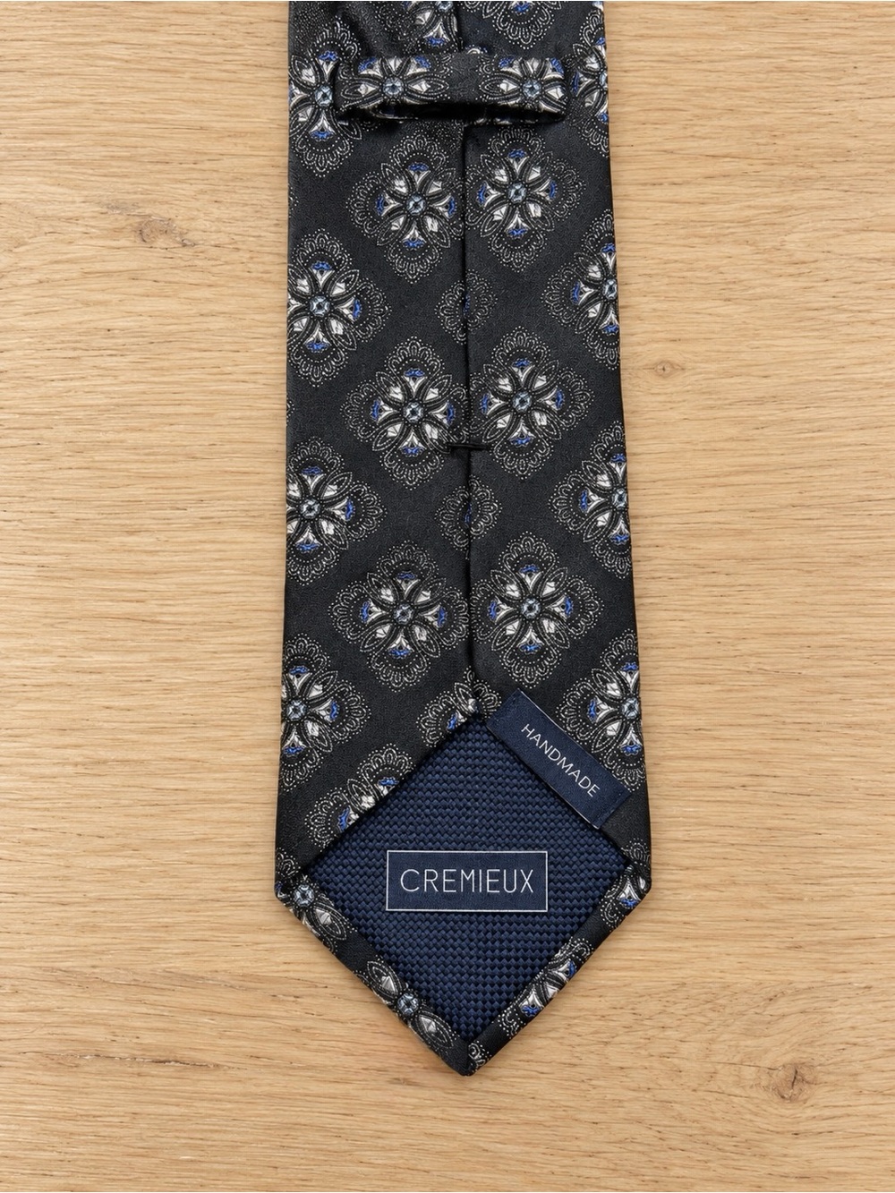Daniel Cremieux Black Tie with Blue and Silver Medallions